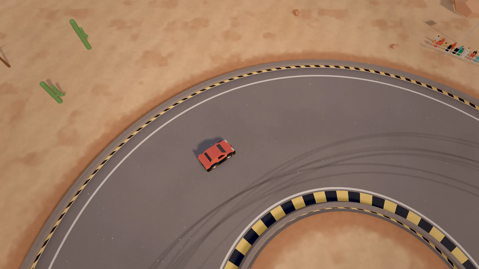 A red car drifting through a long desert sweeper with yellow and black kerbs and cacti in the sand